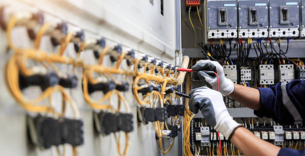 Professional Electrician technician working in Medford, NY